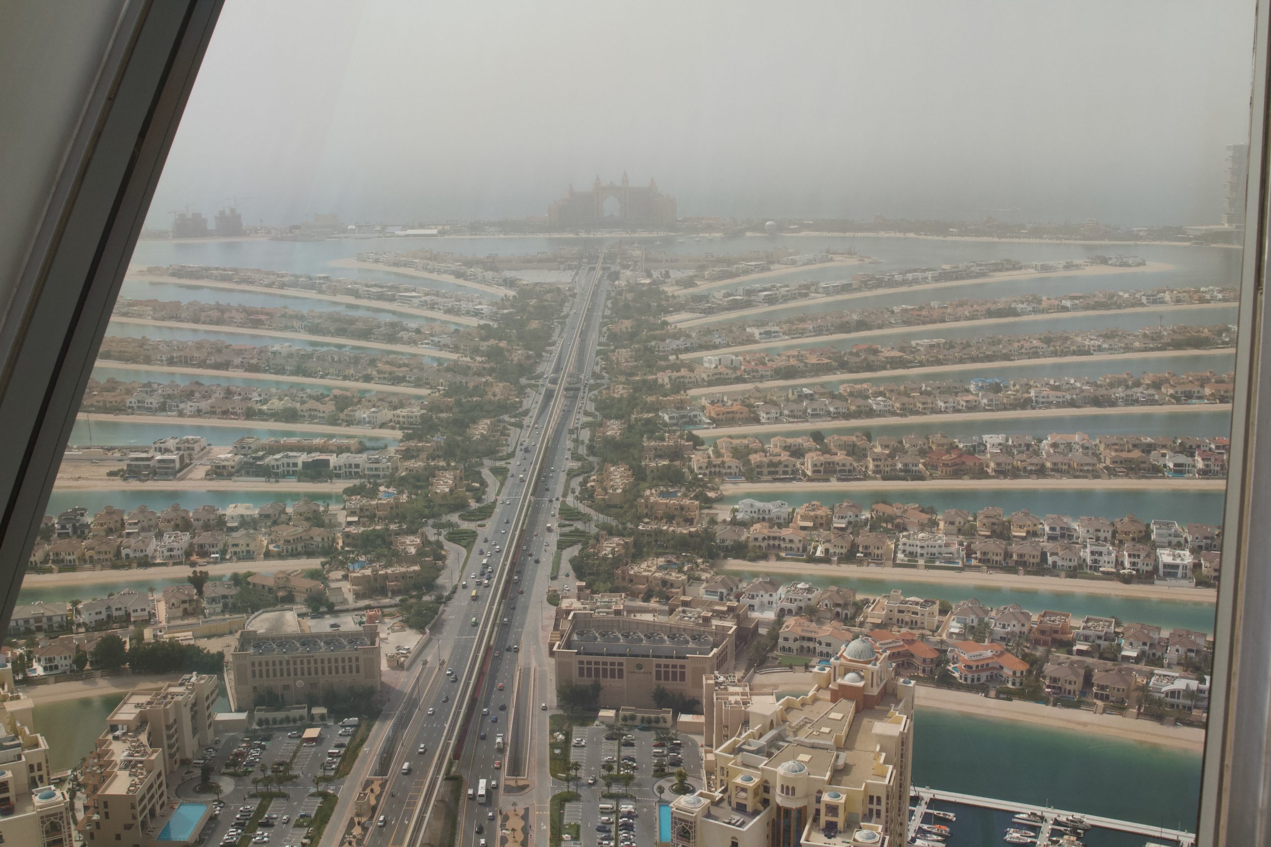 Palm Jumeriah on a smoggy day from The View